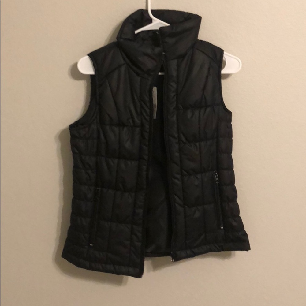 black puffy vest